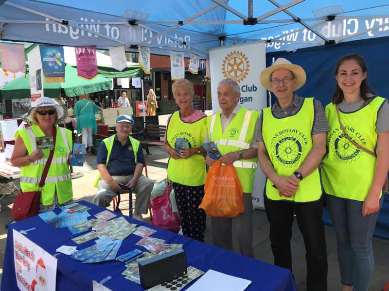 Rotary stall with  members of the Club on duty.