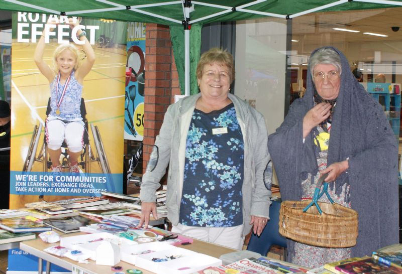 Lowry character "Alice" with secretary Joan and the stall.