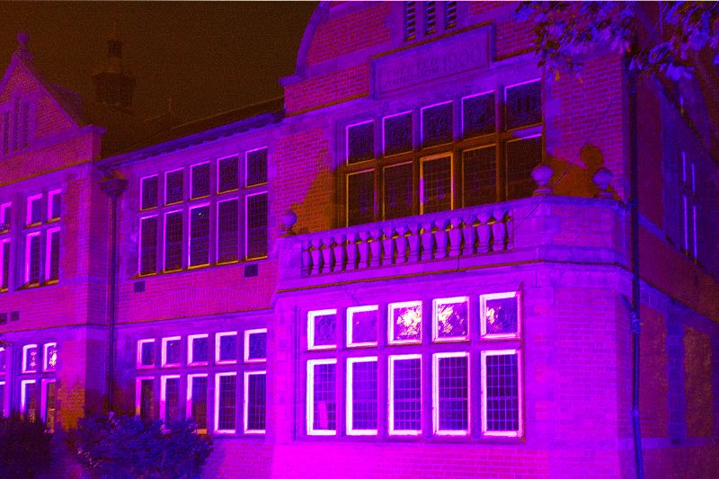 Altrincham Town Hall lit up Purple