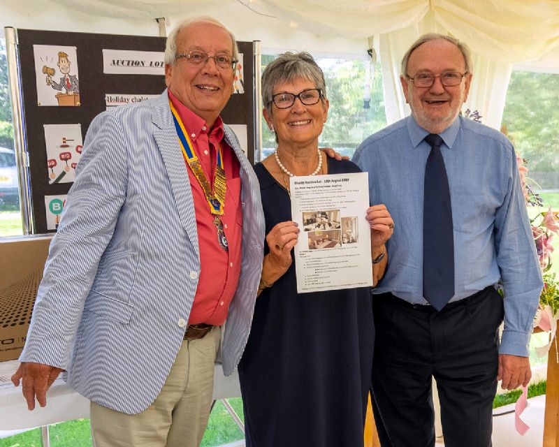 Leslie Young and his wife, Anne, Seen here with Rod Goodier, made the winning bid in the Auction for a week in a 5 Star Holiday Lodge in Anglesey