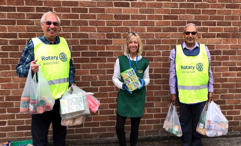 Pic l-r Ken Garrity, Altrincham Rotary, Nicky Kenrick, manager South Trafford Food Bank, Rtn Sudershan Verma