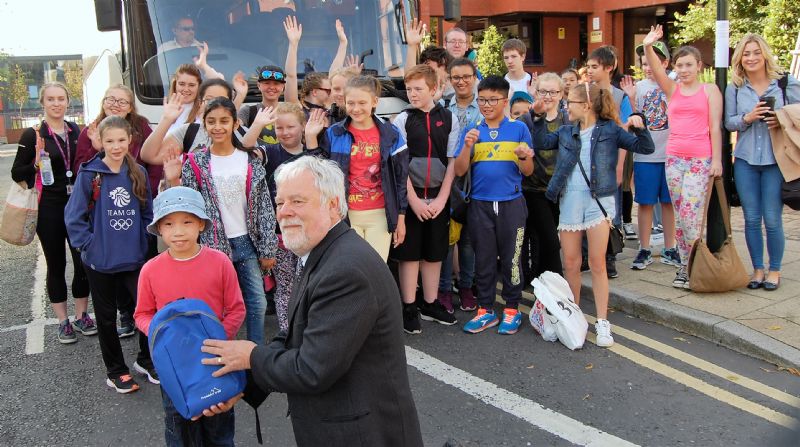 Thirty five Young Carers are wished bon voyage by President of Oldham Rotary, Neil Taylor.