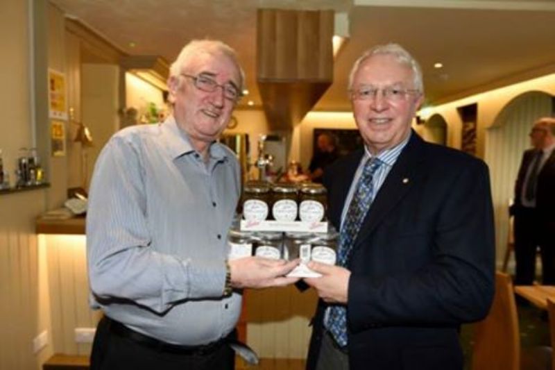 Rotary presidents, Nigel Dobson, left of Onchan, and Howard Callow, right, of Douglas with the Rotary jam to support the end polio campaign