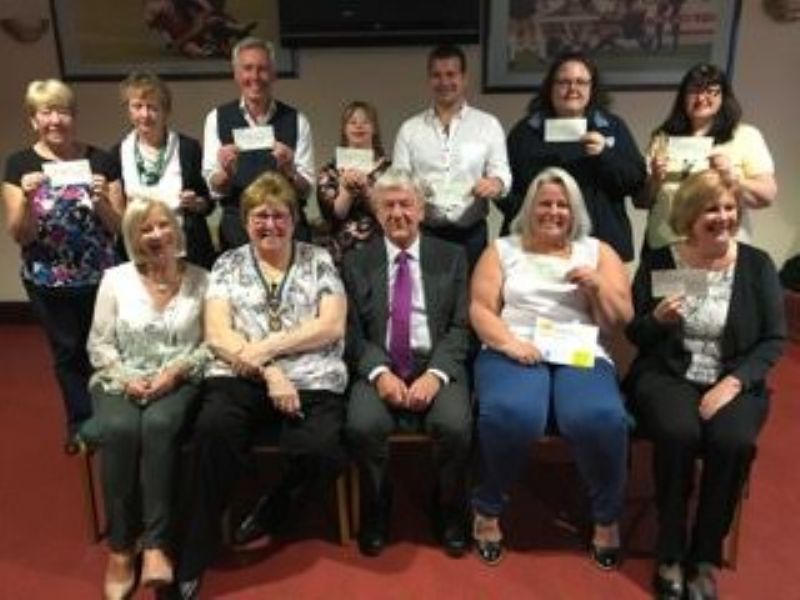 PHOTO  -Front Row Left to Right:Aujke Clegg OBE, President Maureen Bilsbrough, Peter Cheetham and two of the successful groups representativesBack Row;A Representative from each of the other successful groups.