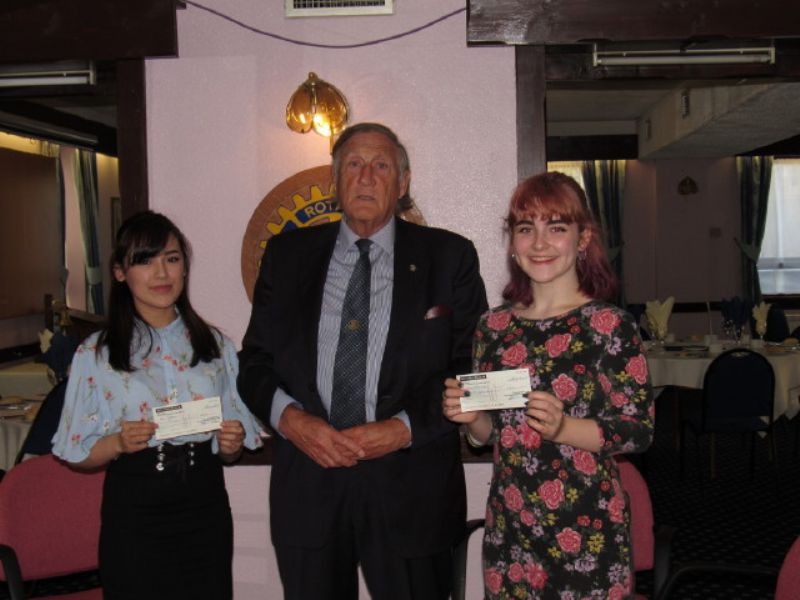 Asia Ogden and Victoria Hoover being presented with their awards by Mike Ingram