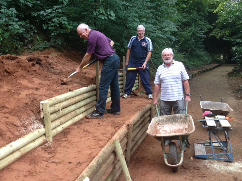 The attached photo shows President Martin Gravestock and Rotarians Peter Swann and David Ash, working on the barrier to protect the Bateman walk.