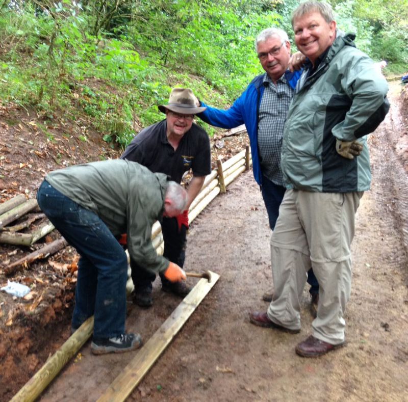 President Martin Gravestock and Rotarians Mike Broom, Rob Lomas and Steve Beasley, working on the barrier to protect the Bateman walk.