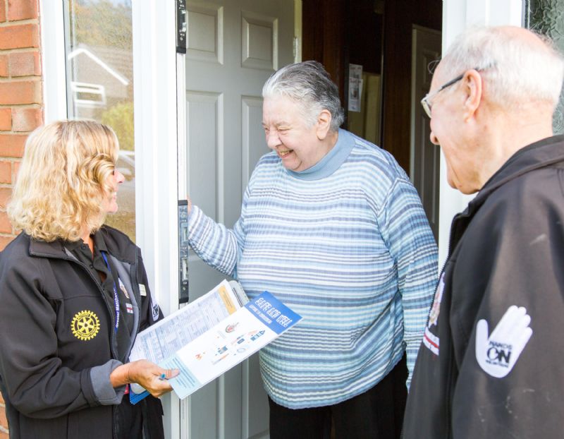 The photograph shows Mrs Yvonne Valentine with Rotary team members Yvonne Frazer-Bastable and Dennis Hobson.